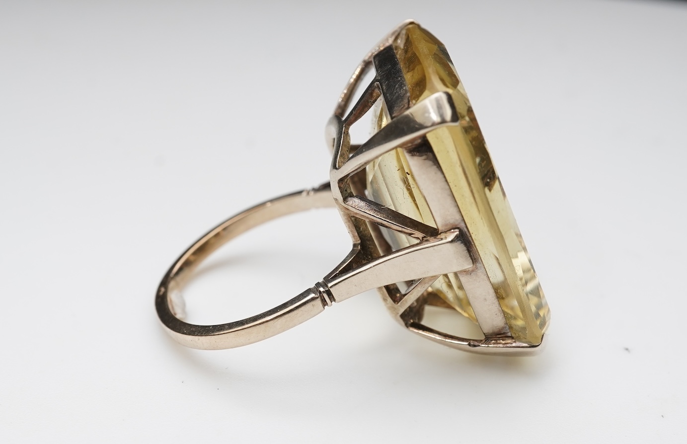 A collection of citrine jewels and a paste bracelet